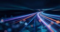 Dynamic light trails creating colorful streaks across dark background representing speed, technology and digital transformation for modern designs.