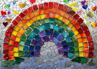 Vibrant rainbow mosaic artwork featuring colorful glass tiles arranged in an arc pattern against gray background, showcasing spectrum of colors in decorative wall art piece.