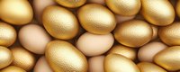 Golden and natural colored eggs background pattern with textured metallic surface creates luxurious Easter holiday composition for festive designs and celebrations.