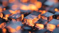 Illuminated keyboard keys with orange backlighting creating atmospheric glow effect, close-up macro photography showing reflective surfaces and bokeh lighting.