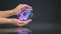 Female hands protecting glowing neon rocket icon symbolizing startup business growth, innovation and entrepreneurship concept on dark background.