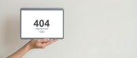Person holding tablet displaying 404 error message against neutral background, representing website page not found, server error, and digital communication failure for web design and technology concepts.