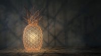 Glowing geometric pineapple lantern with warm golden light on dark wooden surface and moody background for home decor.