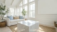 Bright modern living room with white sofa, marble coffee table, natural light from large windows, minimalist Scandinavian interior design for home decor.