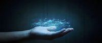 Human hand holding glowing blue digital network connections and data particles floating above palm against dark background for technology concepts.