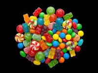 Colorful mixed candy pile with gummy bears, lollipops, and coated chocolates, isolated on transparent background, ready for stickers, t-shirt design, and print on demand.