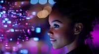 Young African American woman with curly hair gazing at futuristic holographic interface with glowing purple and blue digital elements in cyberpunk style lighting.