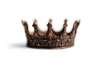 Antique bronze crown with ornate floral details and pointed peaks photographed in soft focus against white background, isolated royal symbol for design projects.