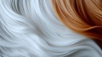 Contrasting white and copper blonde wavy hair strands in close-up macro shot showing smooth, silky texture and flowing curves. For beauty and hair care advertising.