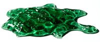 Glossy emerald green liquid blob with organic flowing shape and reflective surface, suitable for abstract backgrounds, design elements, and modern artistic projects.