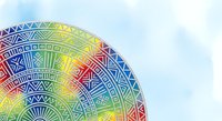 Colorful mandala wheel with geometric patterns in rainbow gradient colors, featuring intricate tribal and ethnic designs, isolated on white background for design projects.
