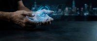 Male hand holding glowing digital globe with data network interface, representing global connectivity, technology innovation, and business solutions for corporate communications.
