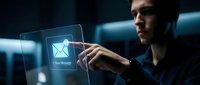 Male professional of Middle Eastern descent interacting with holographic email interface in modern office setting, representing digital communication and technology innovation.
