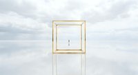 Golden frame floating in serene cloudy sky with reflection, minimalist surreal concept for luxury branding and creative design projects.