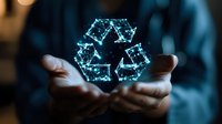 Glowing blue recycling symbol made of connected dots and lines floating above cupped hands against dark background, representing sustainability and eco technology.