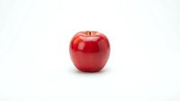 Fresh red apple isolated on white background for healthy eating and nutrition concepts.