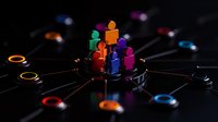 Colorful human figures connected in network structure on dark background representing social connections, teamwork and digital communication concept.