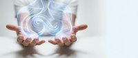 Hands cupping glowing ethereal energy swirls with mystical light effects for spiritual healing meditation and wellness concepts on white background.