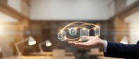 Businessman hand holding digital hologram of smart home devices and automation technology in modern office environment for IoT solutions.