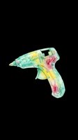 Translucent hot glue gun filled with colorful beads in green, yellow, and pink chambers, isolated on transparent background ready for clipart, t-shirt design, stickers, and print-on-demand products.