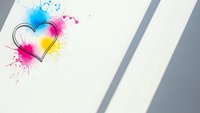 Colorful heart with vibrant paint splashes and swirls on white paper background with diagonal shadows for creative design projects and romantic themes.