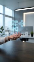 Hand holding digital payment and NFC technology icons floating above palm in modern office workspace with bright windows and contemporary lighting.