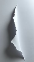 Torn paper edge creating dramatic shadow effect on light background, revealing layered texture and depth. Artistic composition for graphic design projects.
