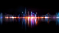 Modern city skyline with vibrant neon reflections on water surface at night, featuring glowing skyscrapers and colorful light streaks creating mirror effect.