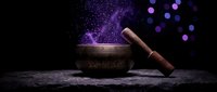 Mystical singing bowl with wooden mallet emitting purple magical energy and sparkles against dark cosmic background for meditation and spiritual healing.