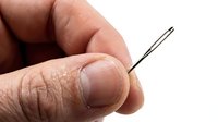Close-up of hand holding sewing needle, isolated on white background. Suitable for tailoring, crafts, sewing tutorials, and needlework design projects.