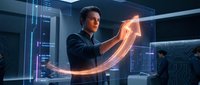 Businessman in dark suit gestures at glowing upward arrow in futuristic digital environment, representing growth, success, and financial progress in modern technology setting.