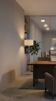 Modern minimalist home office interior with wooden desk, floor lamp, and built-in shelving in neutral tones for contemporary workspace design.