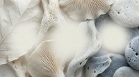 Delicate white and gray mushroom caps with intricate gill patterns scattered on neutral background for organic nature design projects.