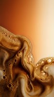 Foamy beer or cola beverage with bubbles and condensation droplets flowing against warm gradient background, suitable for beverage advertising and promotional materials.