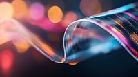 Vibrant light trails and bokeh effects create dynamic motion against dark background, featuring smooth flowing curves in blue and pink neon colors.