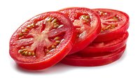 Fresh sliced red tomato rounds stacked on white background, showing juicy interior with seeds. Ideal for food photography and culinary designs.