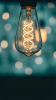 Vintage Edison bulb with spiral filament glowing warmly against blurred bokeh lights background for creative lighting and interior design concepts.
