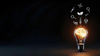 Glowing light bulb with floating innovation icons on dark background representing creative ideas, brainstorming and business solutions for presentations.