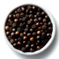 Black peppercorns in white ceramic bowl on dark background, macro shot showing texture and natural variations in spice color and shape.