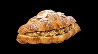 Croissant sandwich with savory filling isolated on transparent background, ready for menu design, food packaging, restaurant graphics, print-on-demand products, and culinary marketing materials.