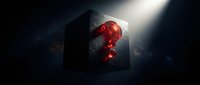 Dark mysterious cube with glowing red question mark symbol illuminated by dramatic light beam against black background for concept design.
