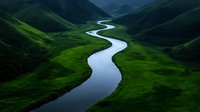 Meandering river flows through lush green valley with rolling hills and mountains, creating dramatic natural landscape in moody atmospheric lighting.