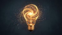 Glowing light bulb with golden particle spiral effect on dark background representing innovation, creativity and bright ideas for business concepts.