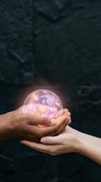 Two hands of different ethnicities holding a glowing pink and purple orb against dark textured background. Concept for unity, collaboration, energy, and shared vision for business and design projects.