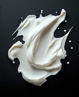 Creamy white milk splash with dynamic flowing waves and droplets isolated on dark background, suitable for dairy, beverage, and cosmetic product advertising.