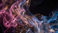 Colorful smoke swirls with pink and blue hues creating abstract flowing patterns against dark background with golden particles for creative design projects.