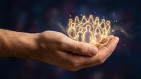 Male hand holding glowing neon people figures with sparkling light effects against dark background. Represents community, teamwork, leadership, and human connection for business concepts.