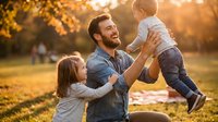 Happy father playing with children outdoors during golden hour sunset. Family bonding time in park with warm autumn light creating joyful parenting moments.