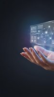 Hands holding futuristic holographic interface with network connections and data analytics dashboard for business technology presentations.