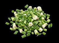 Chopped green onions and scallions isolated on transparent background, ready for culinary design, recipe graphics, food packaging, cooking blogs, restaurant menus, and print-on-demand kitchen products.